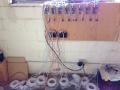 Eight bullroarers and network cables.JPG